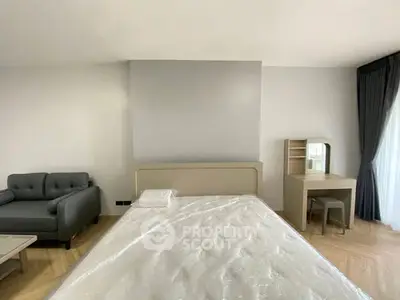 Modern bedroom with stylish furniture and natural light