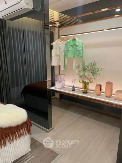 Modern bedroom with stylish decor and open closet space