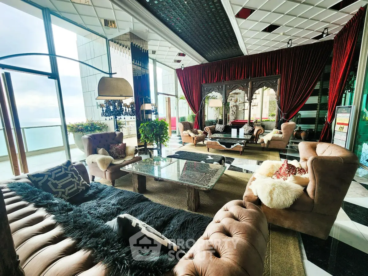 Luxurious living room with plush seating and panoramic city view