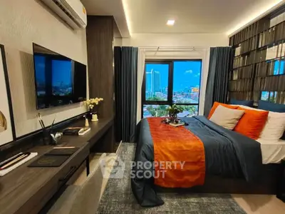 Luxurious bedroom with city view, modern decor, and vibrant bedding