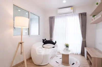 Cozy modern living room with stylish furniture and natural light