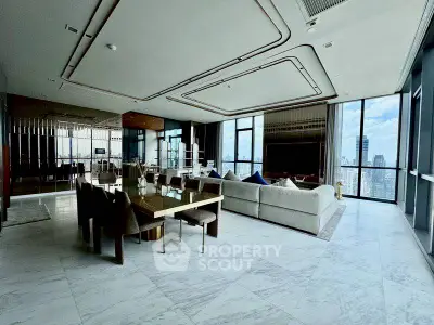 Luxurious high-rise living room with stunning city views and elegant modern furnishings.