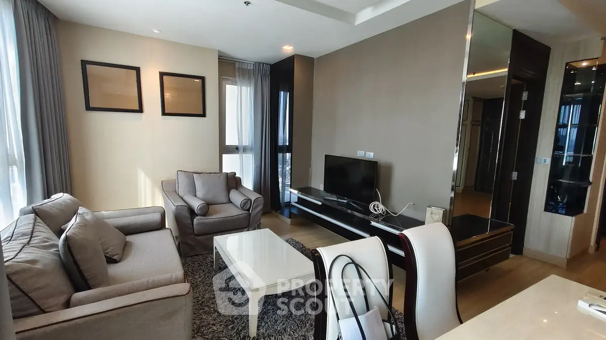 Spacious modern living room with elegant furniture and natural light