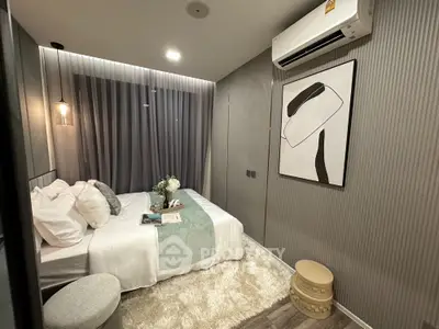 Modern cozy bedroom with stylish decor and air conditioning