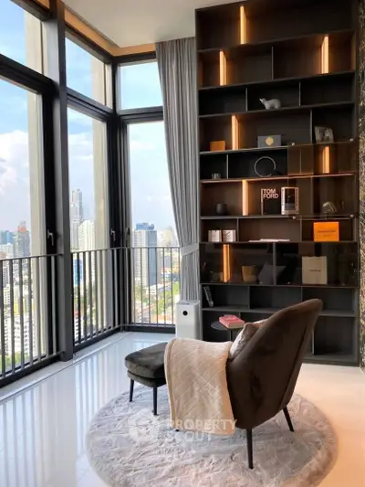 Luxurious high-rise living room with floor-to-ceiling windows and stunning city view