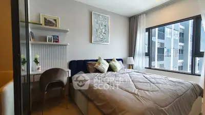 Modern bedroom with large windows and stylish decor in urban apartment