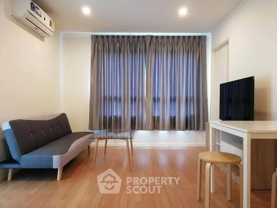 Modern living room with sleek furniture and natural light