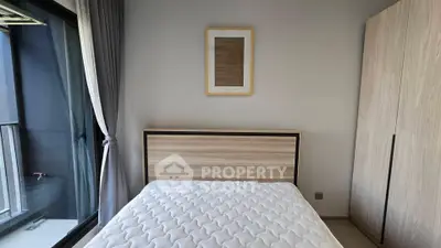 Modern bedroom with minimalist design and large window view