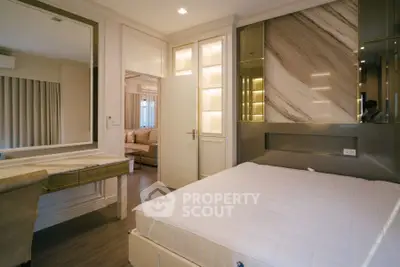 Modern bedroom with elegant decor and ambient lighting
