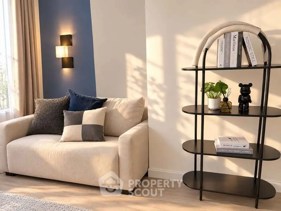 Stylish living room with cozy beige sofa and modern bookshelf