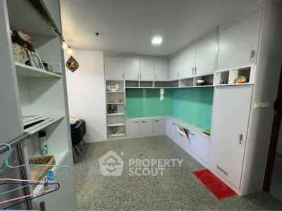 Spacious study room with built-in cabinets and modern design