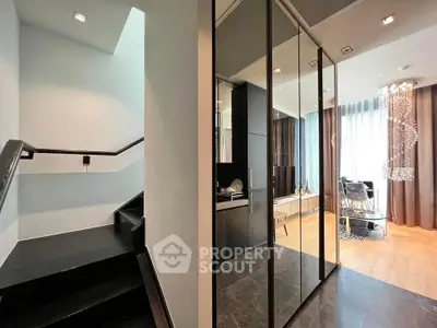 Modern duplex interior with sleek staircase and stylish living area