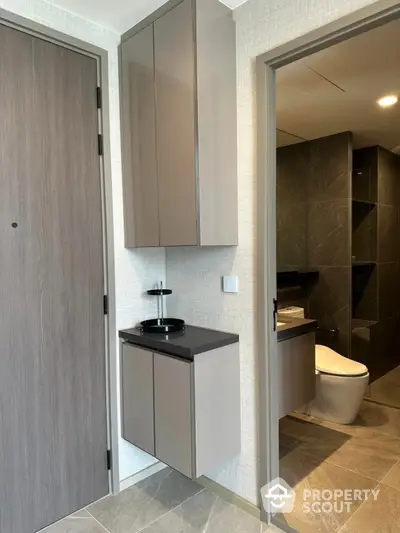 Modern bathroom with sleek cabinetry and contemporary design