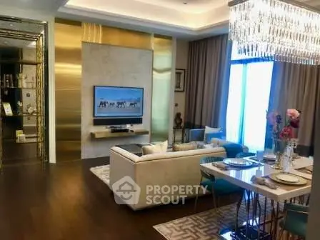 Luxurious living room with elegant chandelier and modern decor