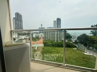 Stunning balcony view of city skyline and lush greenery in modern apartment