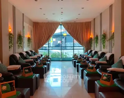 Luxurious spa-like interior with plush seating and ambient lighting, perfect for relaxation and rejuvenation.