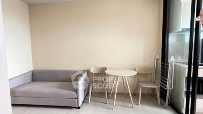 Modern living room with cozy sofa and dining set in a stylish apartment