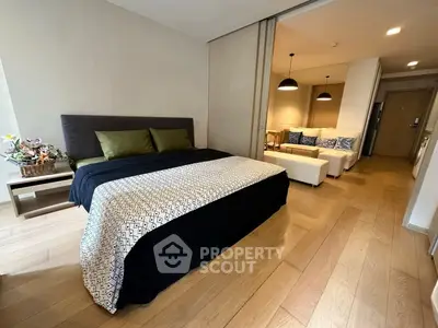 Modern studio apartment with cozy bedroom and stylish living area