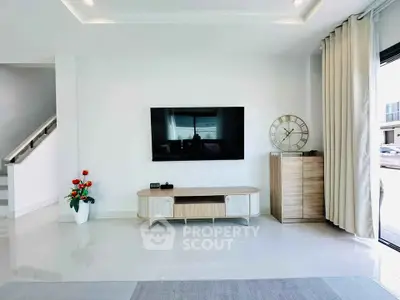 Modern living room with sleek TV setup and stylish decor