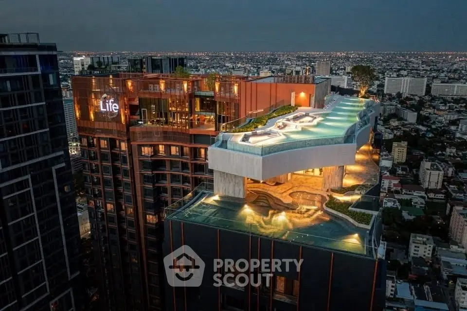 Stunning rooftop pool with panoramic city views at luxury high-rise building