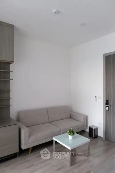 Modern living room with sleek furniture and minimalist design