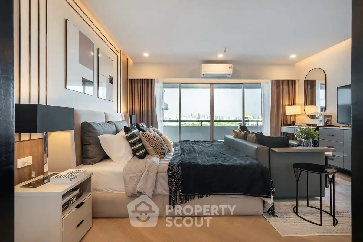 Luxurious modern bedroom with stunning city view and elegant decor