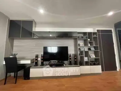 Modern living room with sleek entertainment center and stylish decor