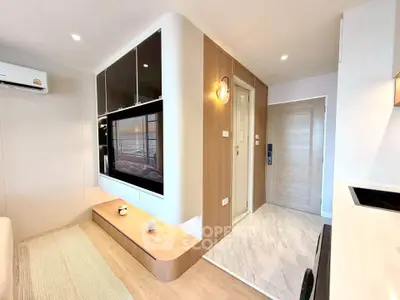 Modern apartment interior with sleek design and wooden accents, featuring a cozy living area and stylish entrance.