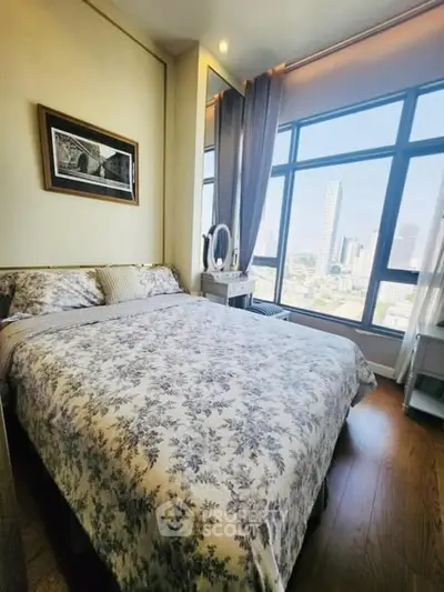 Luxurious bedroom with stunning city view and elegant decor