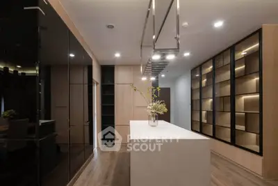 Modern kitchen with sleek cabinetry and elegant island centerpiece