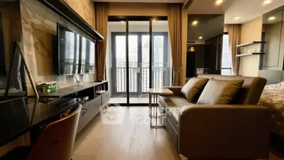 Modern living room with sleek furniture and balcony view in luxury apartment