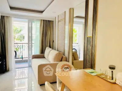 Bright living room with modern decor and balcony view in a stylish apartment.