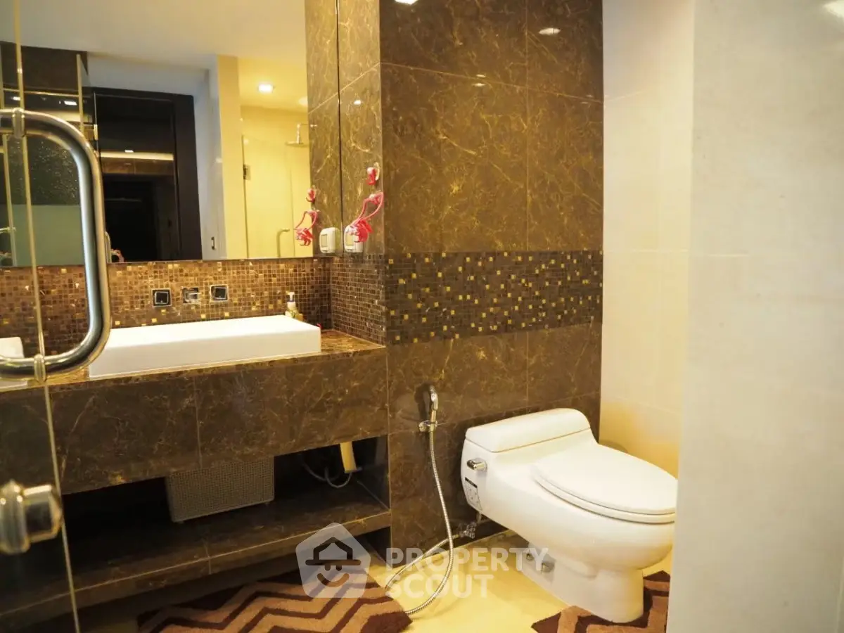 Luxurious bathroom with elegant marble finishes and modern fixtures