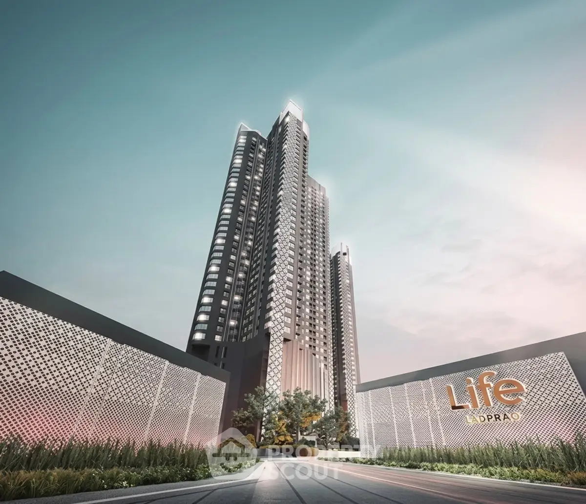 Stunning modern high-rise building with sleek design and lush landscaping at Life Ladprao.