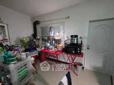 Cozy kitchen with modern appliances and organized storage space.