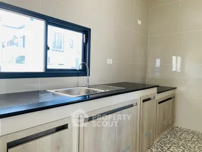Modern kitchen with sleek countertops and stylish cabinetry
