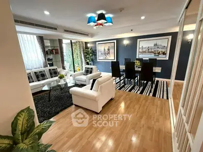 Luxurious living room with elegant decor and spacious dining area