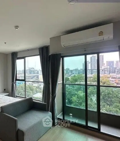 Modern apartment with panoramic city view and large windows