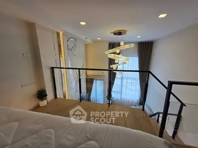 Luxurious modern interior with elegant lighting and stylish decor in a spacious living area.