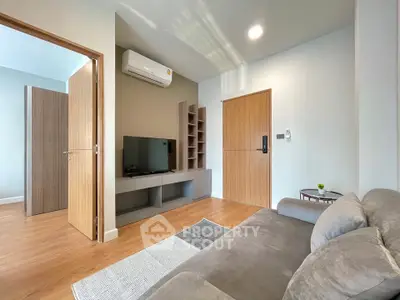 Modern living room with sleek design and cozy ambiance