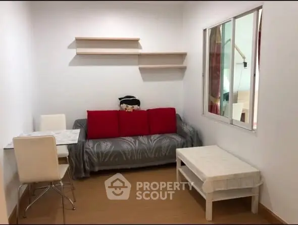 Cozy living room with modern decor and comfortable seating