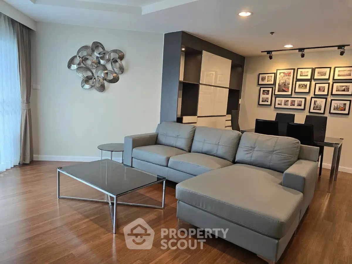 Spacious modern living room with stylish decor and hardwood floors