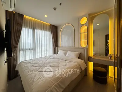 Luxurious bedroom with modern lighting and elegant decor, featuring a cozy bed and stylish vanity area.