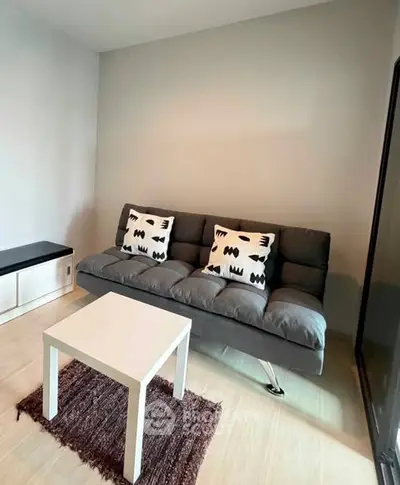 Modern living room with stylish sofa and minimalist decor