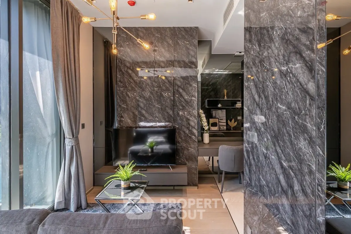 Luxurious modern living room with marble accents and stylish lighting