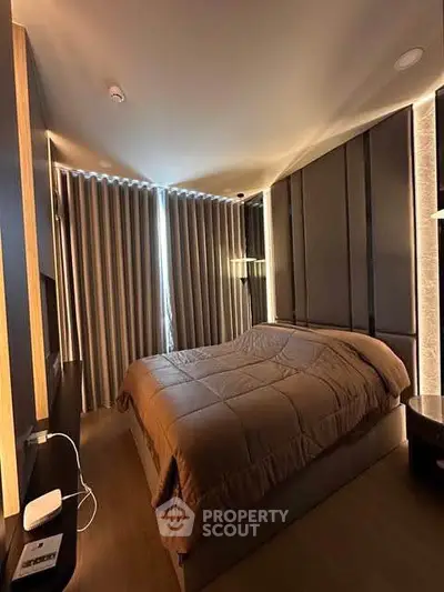 Luxurious modern bedroom with elegant lighting and stylish decor