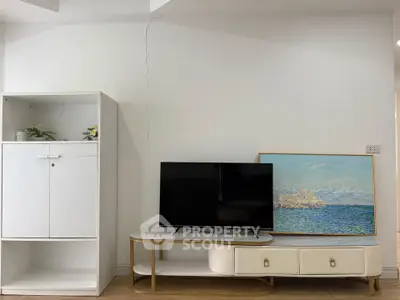 Modern living room with sleek TV stand and minimalist decor