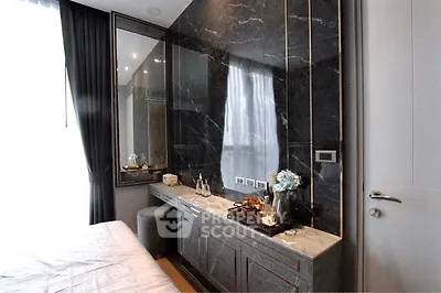 Luxurious bedroom with elegant marble accents and stylish decor
