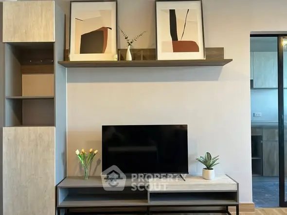 Modern living room with stylish decor and wall-mounted TV unit