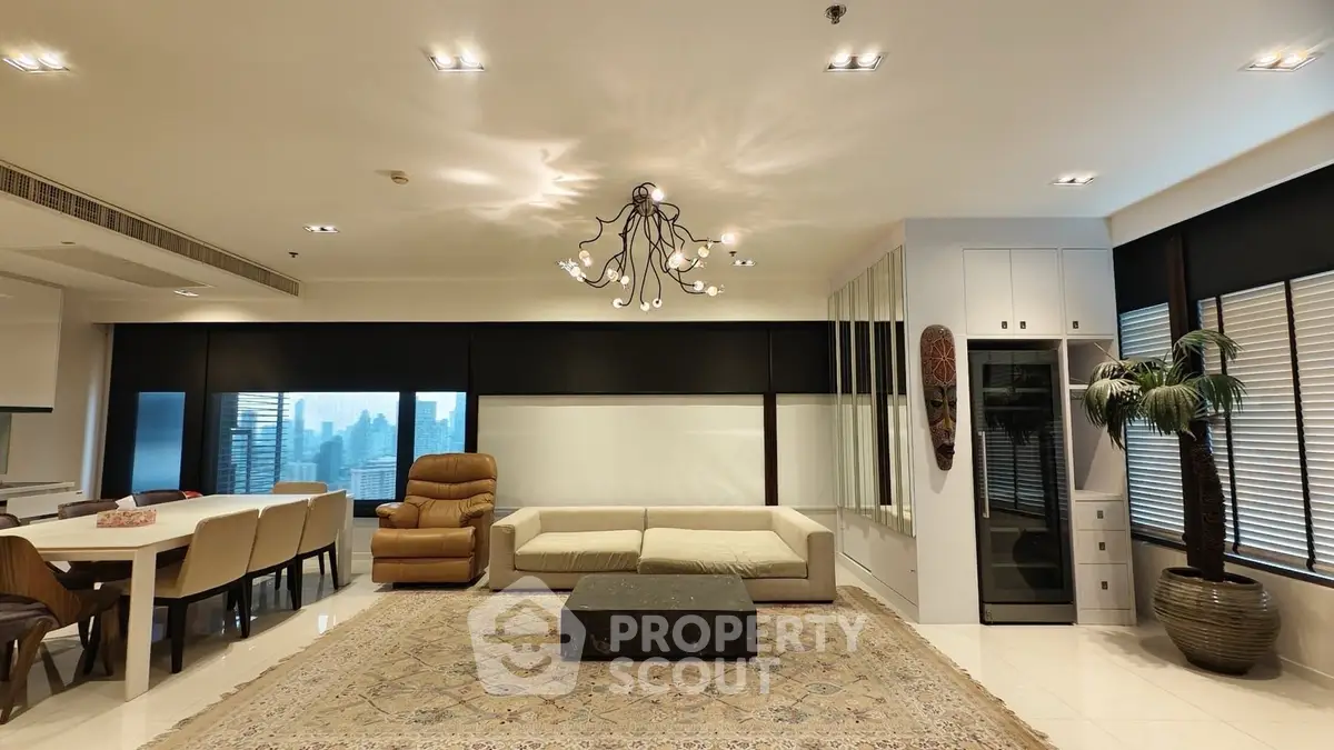 Spacious modern living room with elegant decor and city view